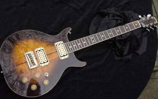 10 Most Expensive Guitars in History. Bob Marley's Custom-made Washburn Hawk- The Blogging Musician @ adamharkus.com