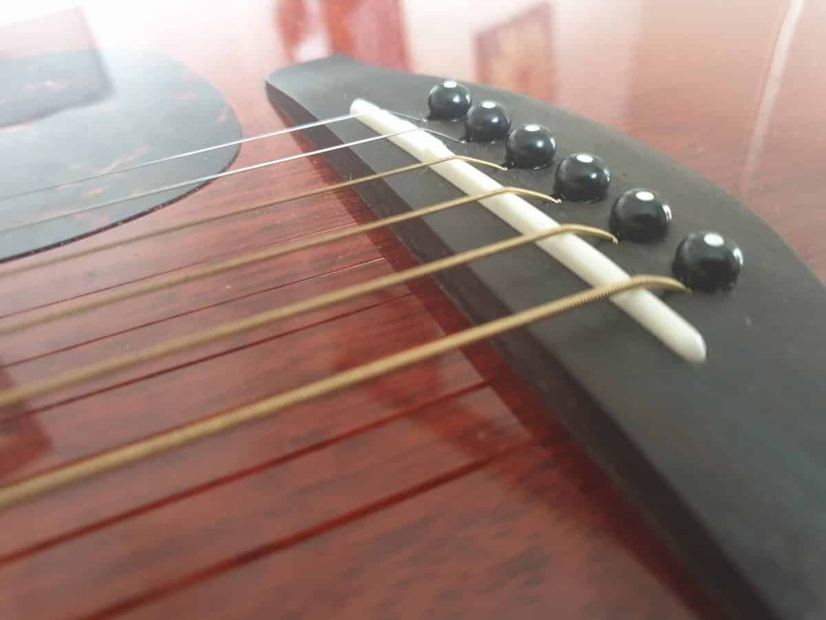 Acoustic Guitar Action: Lowering the saddle. The Blogging Musician @ adamharkus.com