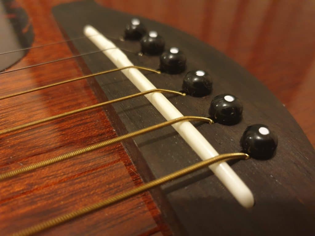 Neck relief on Acoustic Guitars is crucial for great tone. The Blogging Musician @ adamharkus.com