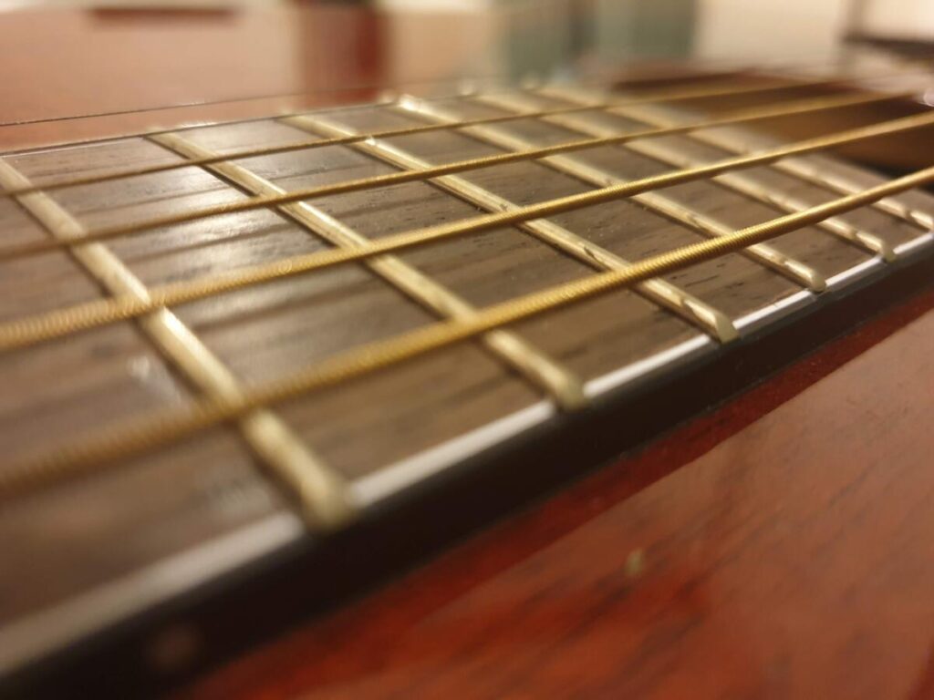 Neck relief on Acoustic Guitars is crucial for great tone. The Blogging Musician @ adamharkus.com