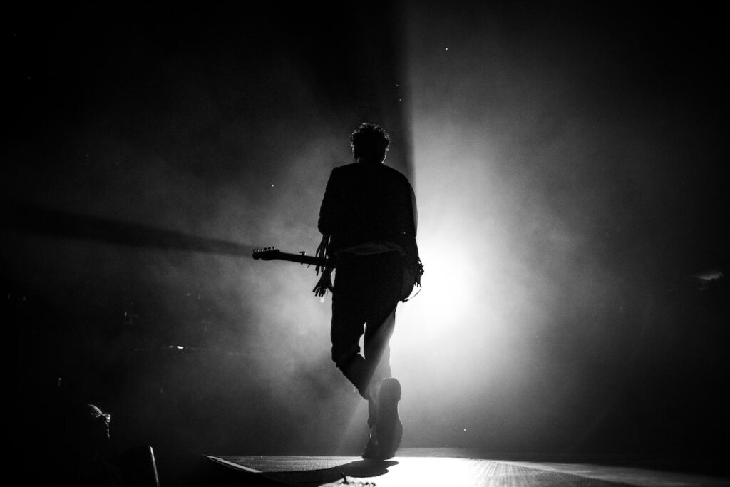 Photo by Wendy Wei: https://www.pexels.com/photo/silhouette-photo-of-man-singing-on-stage-1916824/