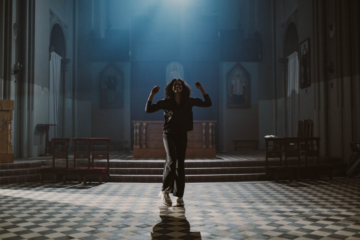 woman dancing inside the church