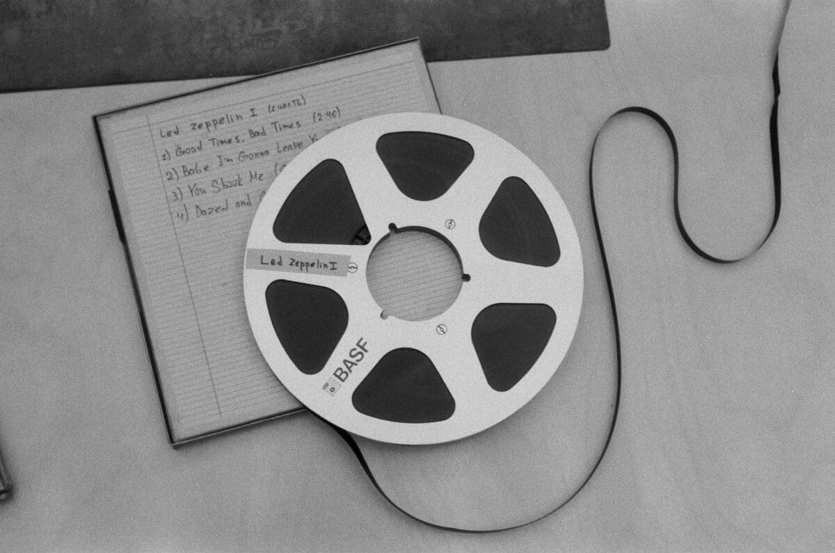 magnetic tape with handwritten song titles on the cover