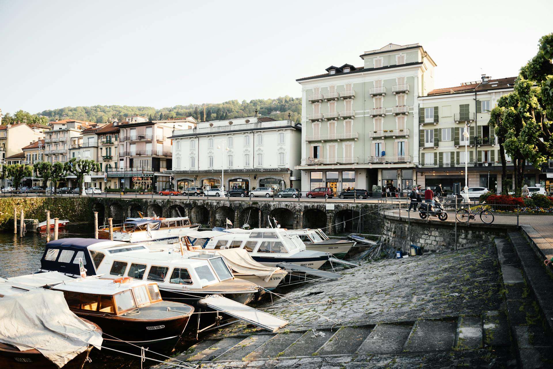 Photo by SHVETS production: https://www.pexels.com/photo/boats-moored-in-the-marina-of-an-italian-town-7946971/